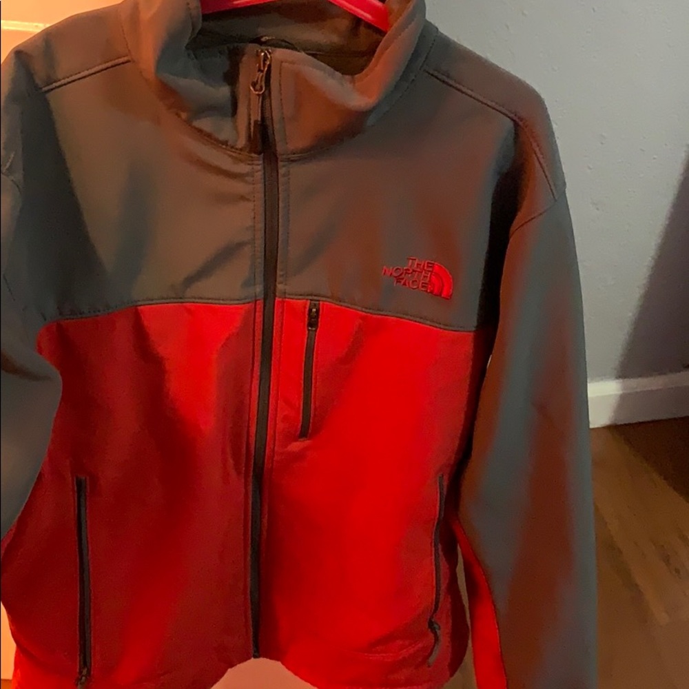 Red north face jacket